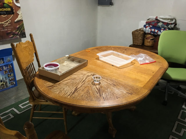 Table with just a few empty containers